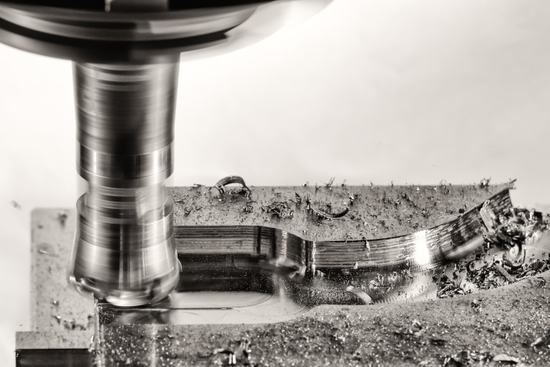 Milling cutter work with splinters flying off, monochrome versio